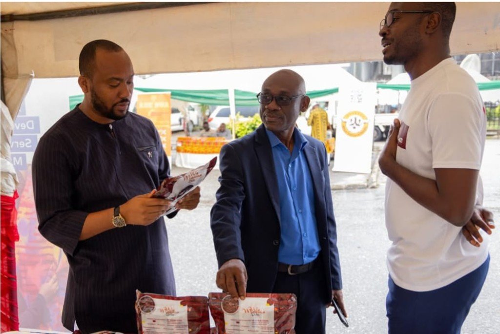 Wo Maame Foods team presenting products at an exhibition